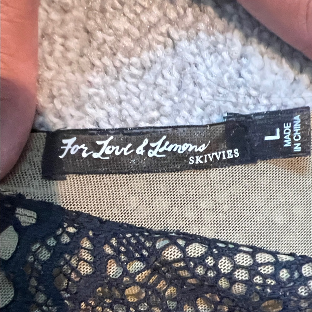 Urban Outfitters Black Lace Bralette over Tan Lining - Picture 2 of 9